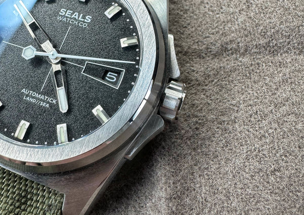 From the Model B Collection, Land // Sea Classic is a 3-hand automatic watch with black dial and bold white and silver applied indices