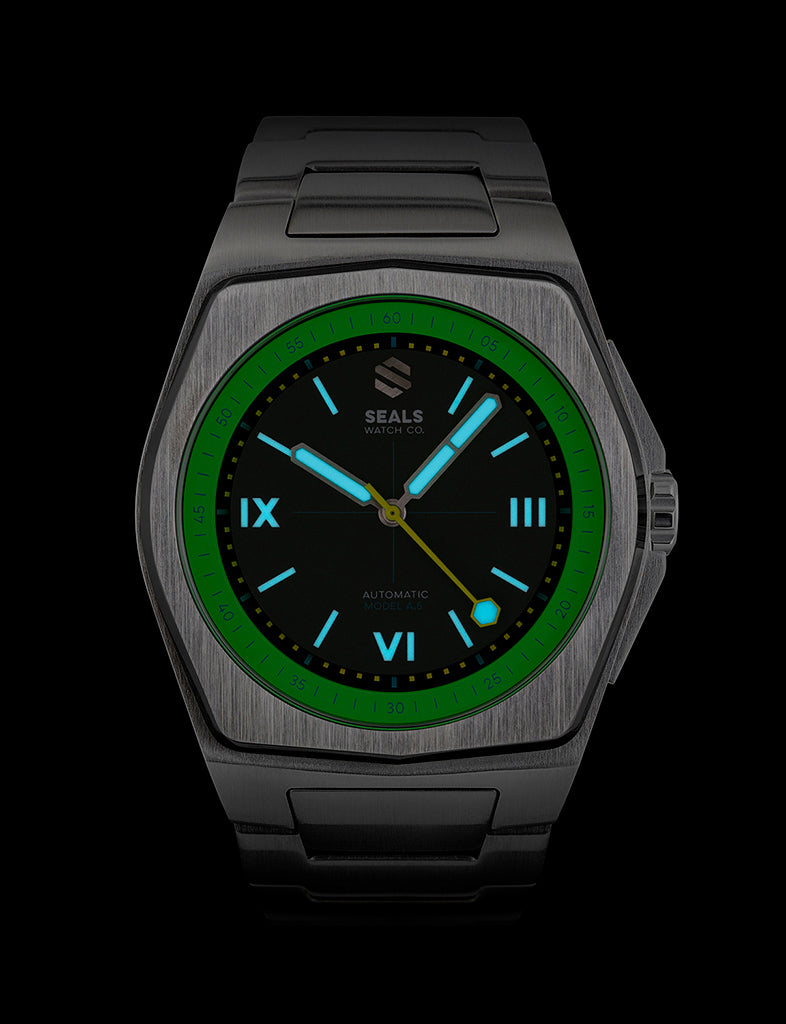 Seals Watch Company Model A.5 Acid Green dial glowing with BGW9 Super-LumiNova in low light