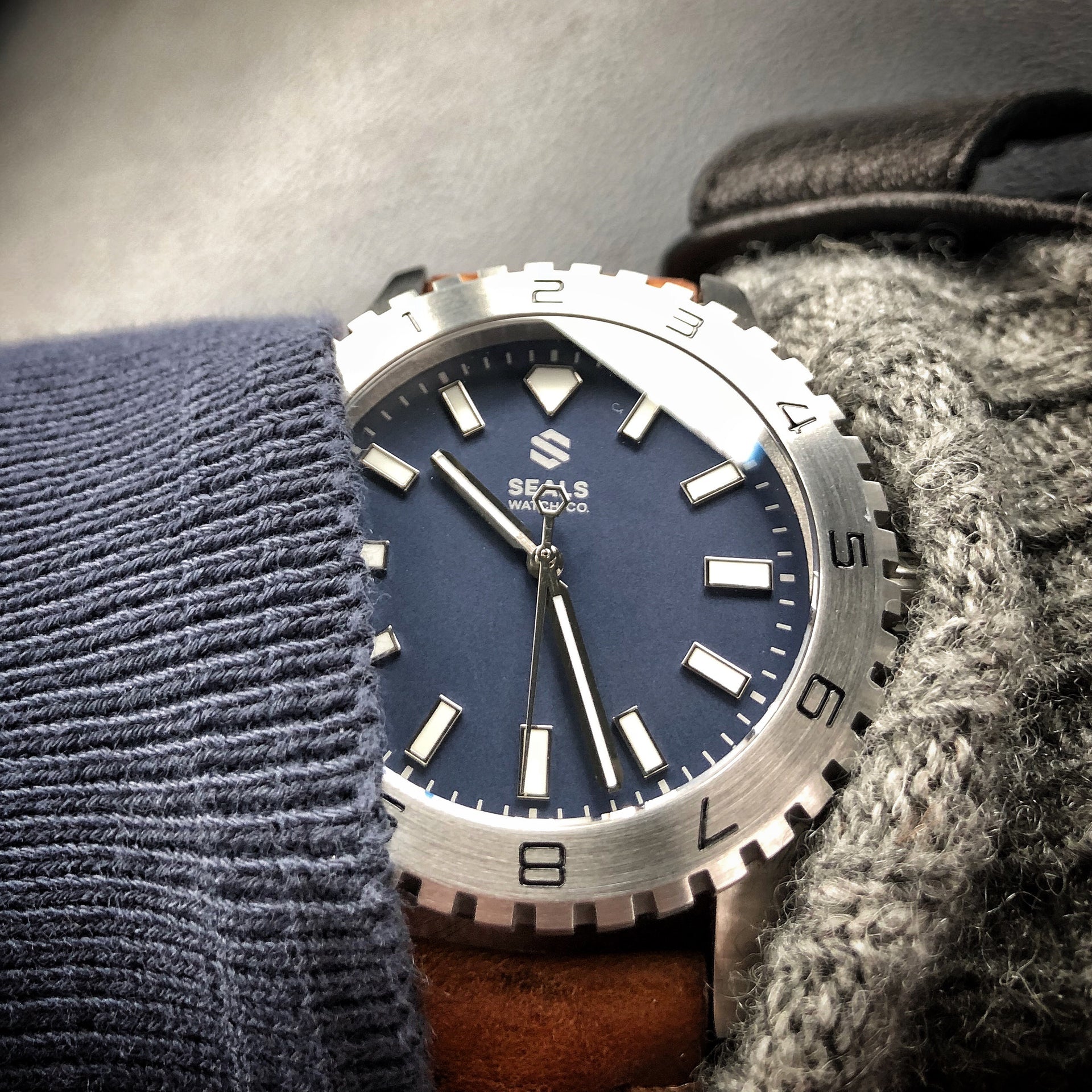 On the Wrist, Dark Seal 200M Water Resistant Automatic Sport Watch with Steel Blue Dial and Applied Indices - American California Microbrand